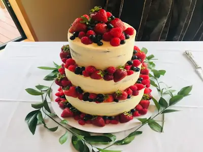 Custom wedding cake with multi-tiered design and with berries - Twisted Flour & Sugar custom cakes Christchurch